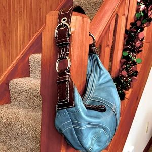 Coach kidney shoulder purse.